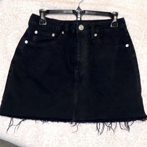 Mini black denim skirt